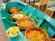 Fresh salad station displayed in a boat-style counter at Benaras Pearl Phu Quoc