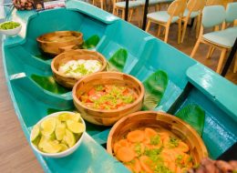 Fresh salad station displayed in a boat-style counter at Benaras Pearl Phu Quoc