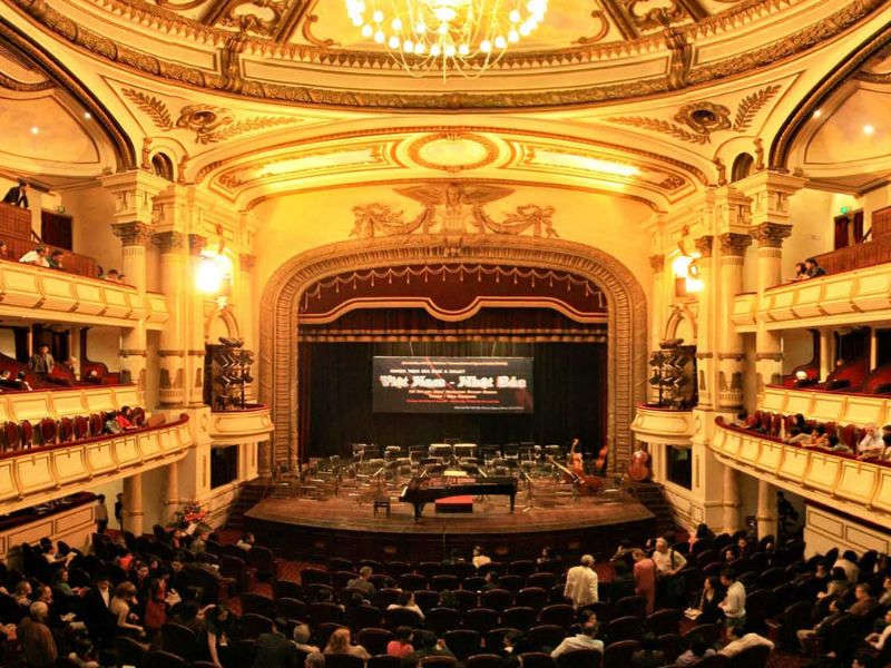 Elegant interior of Hanoi Opera House hosting a live concert