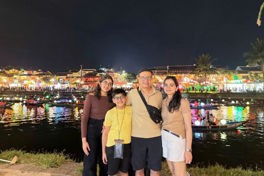 Family checking at Hoi An by night