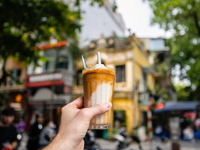 Vietnamese egg coffee in Hanoi Old Quarter street scene