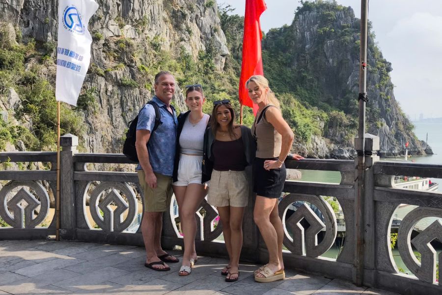 Group of tourists at a viewpoint in Ha Long Bay