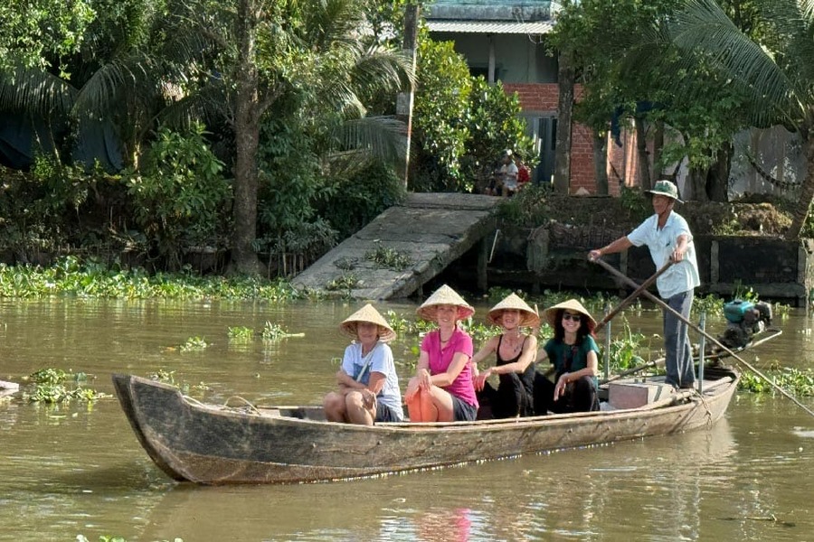 Tourists enjoy Mekong Delta boat trip