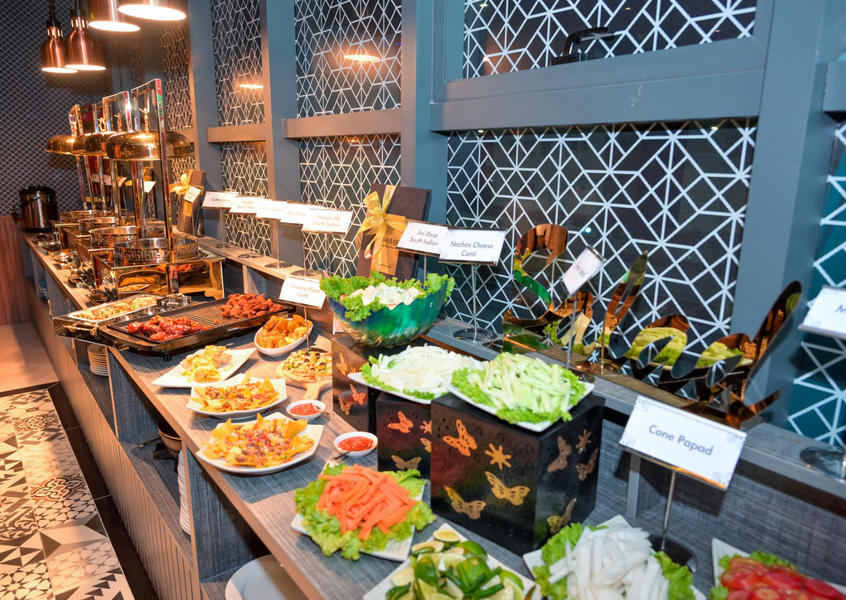 Benaras halal Indian buffet spread with salads and appetizers
