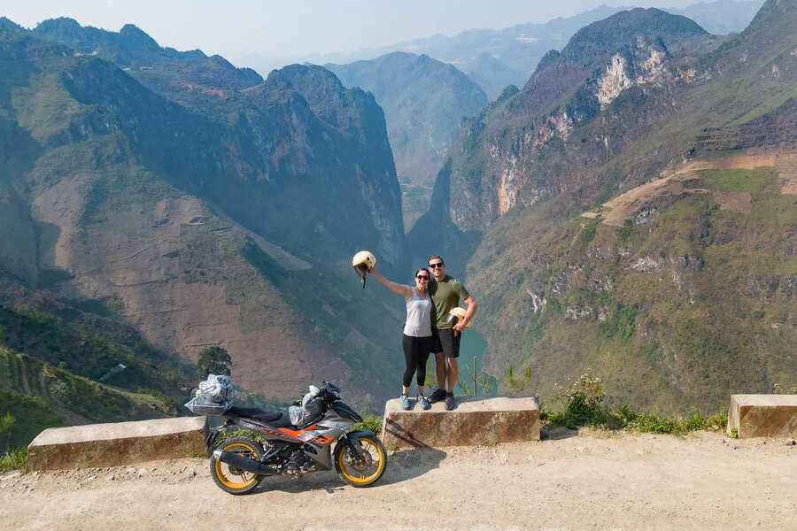 Couple check in at Ha Giang Loop, overlooking Nho Que River