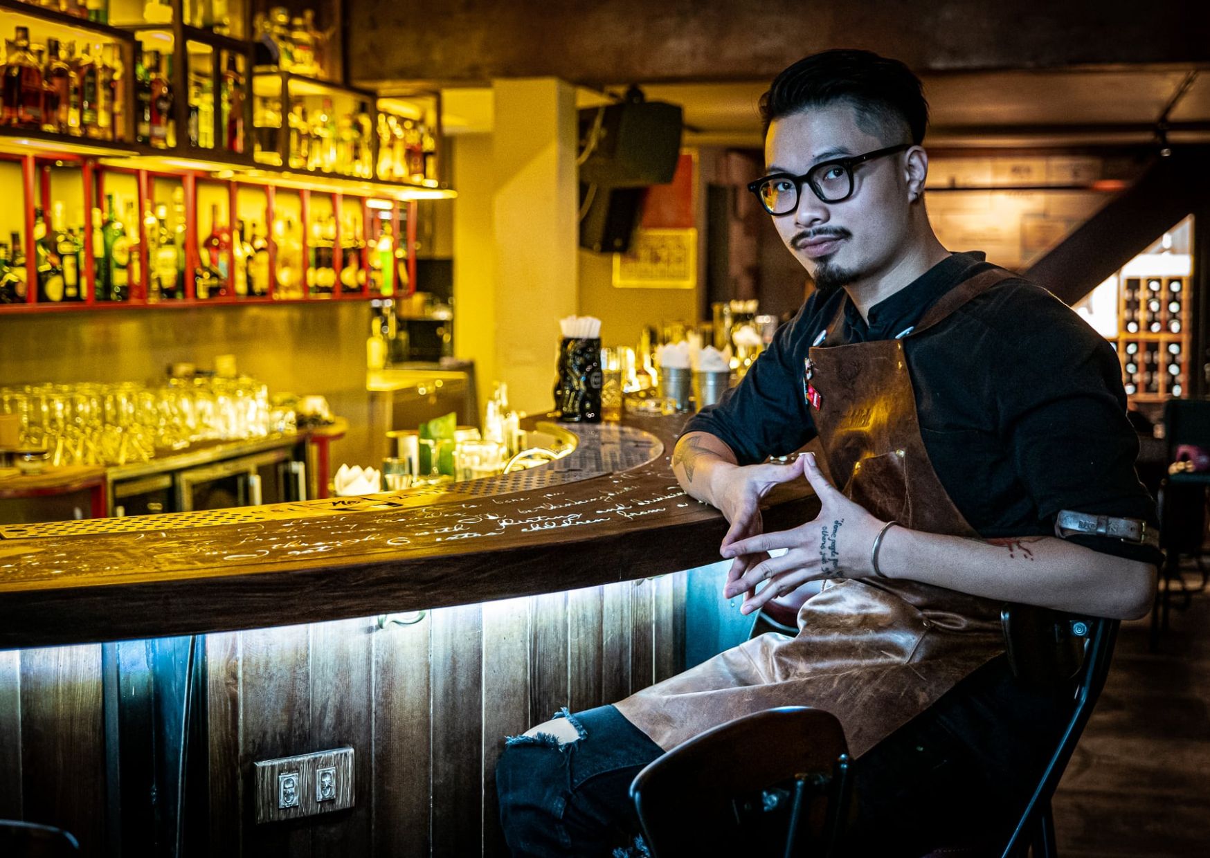 Intimate bar counter with professional mixologists at Ne cocktail bar