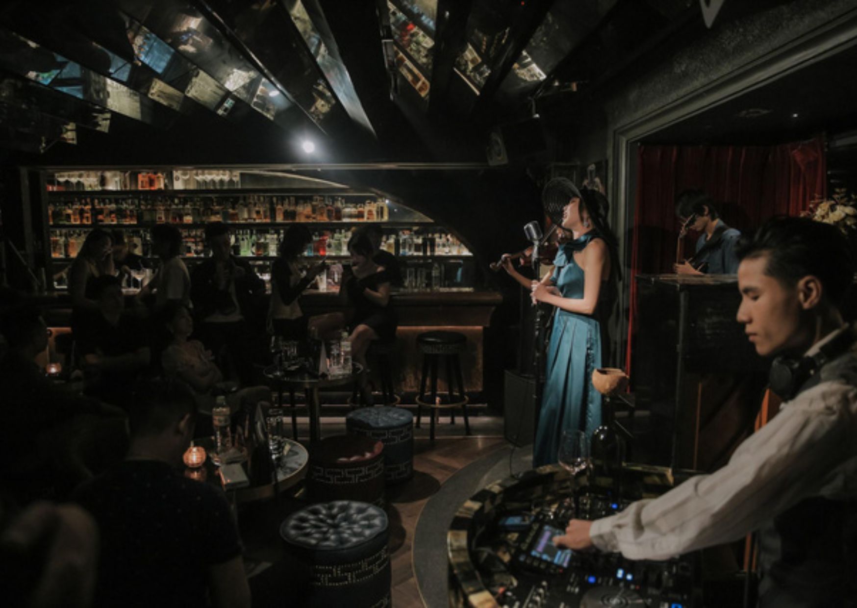 The Black Sheep Theater of cocktails with dramatic lighting