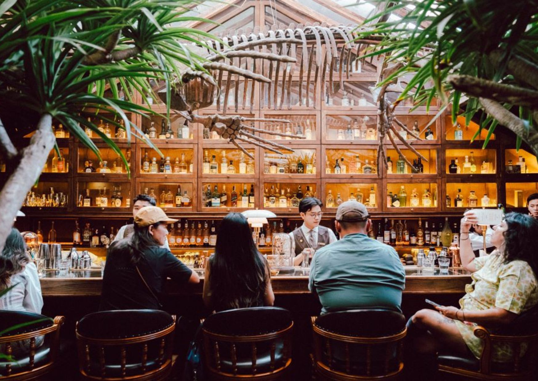 Elegant vintage bar interior with dinosaur fossil decor