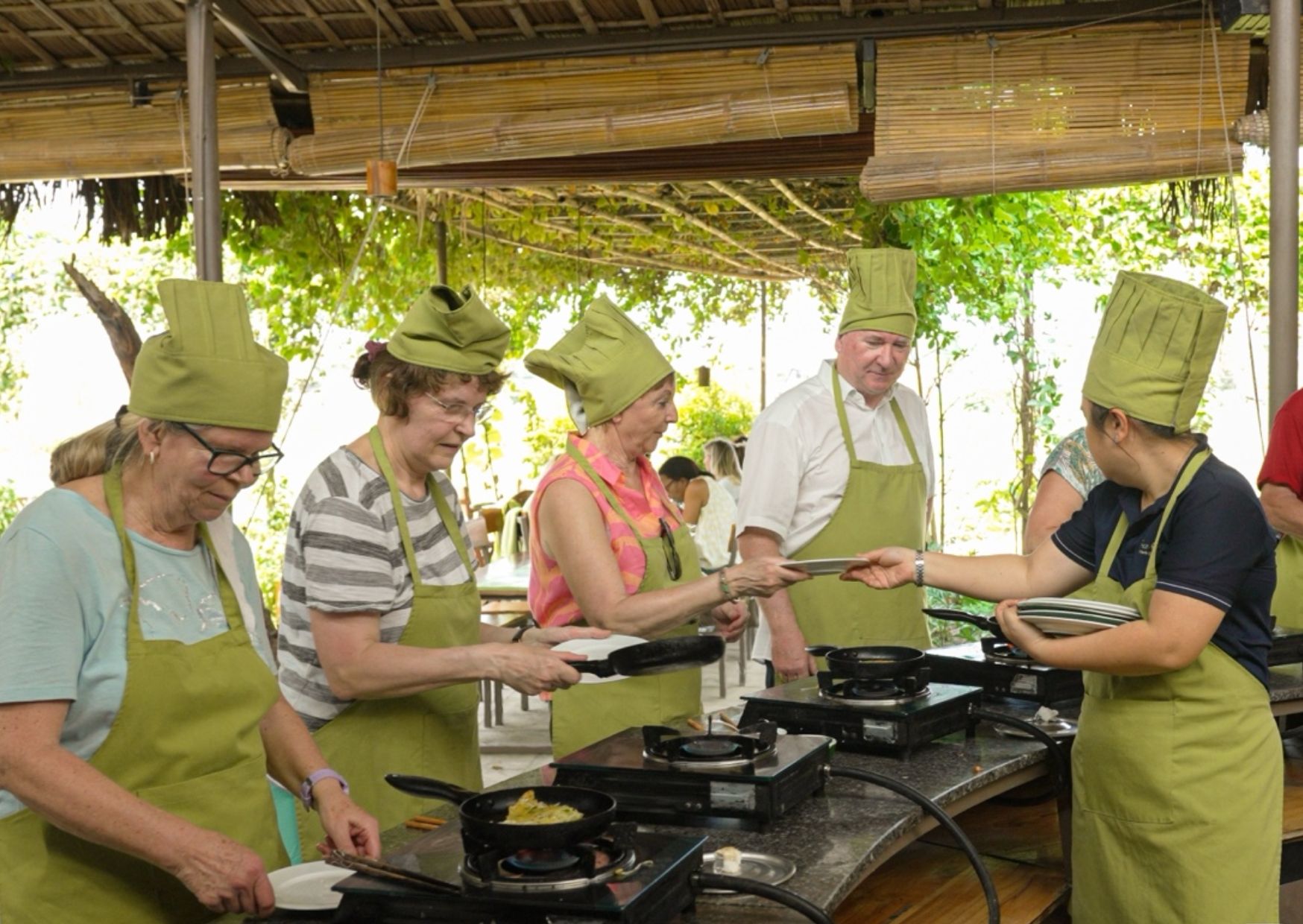 Foreign tourists participating in a Vietnamese cooking class in Da Nang