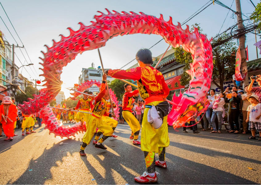 Dragon dance performance on the streets during Tết Nguyên Đán