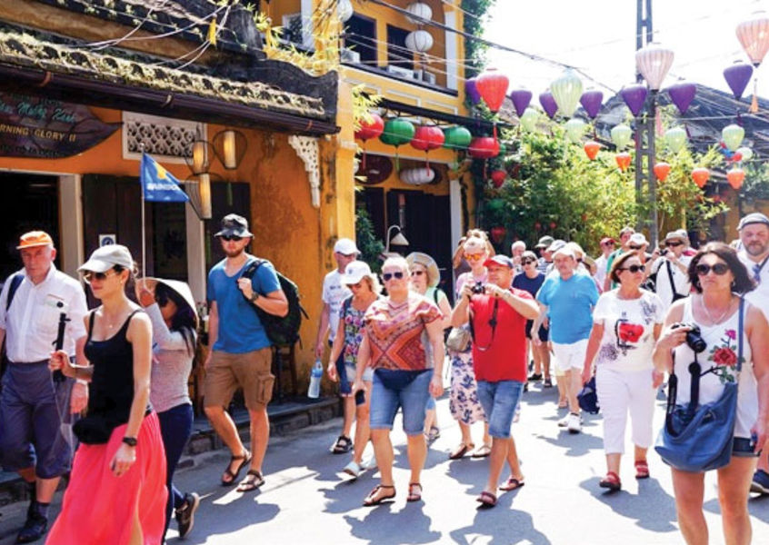 Western tourists in Hoi An ancient town, Vietnam