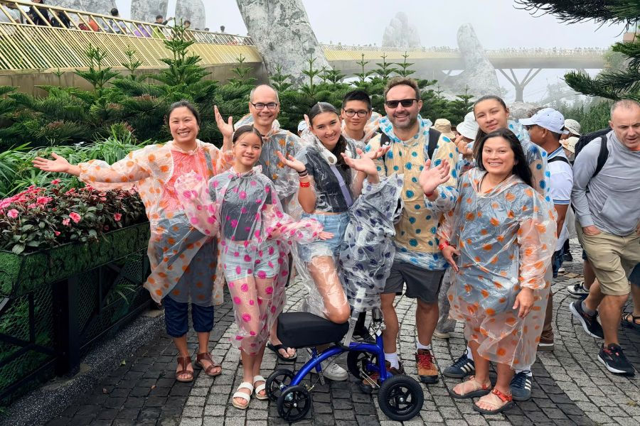 Rain ponchos on at Ba Na Hills' Golden Bridge in Da Nang