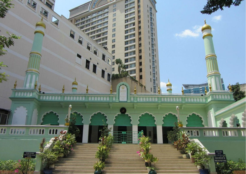 Saigon Central Mosque green facade with twin minarets