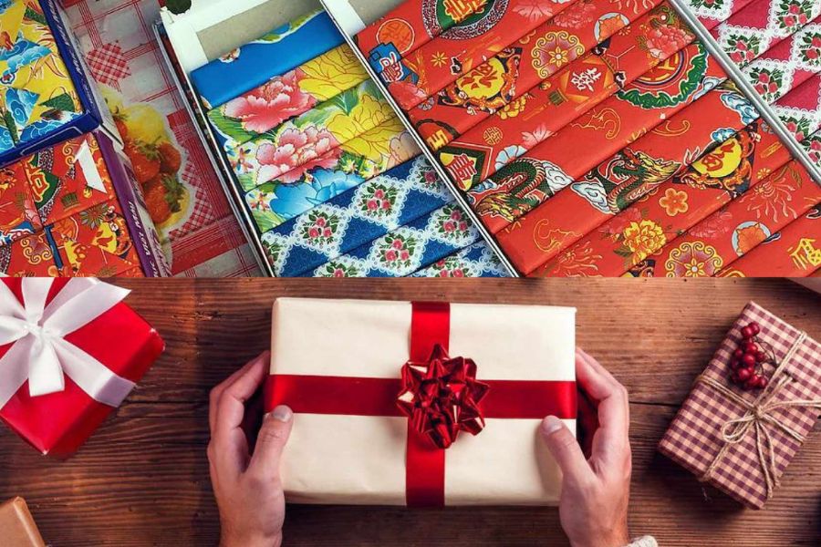 Wrapped gift with red ribbon beside traditional Vietnamese patterned gift paper