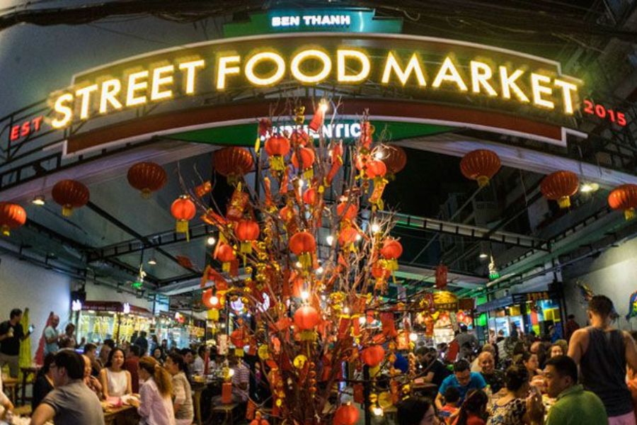 Ben Thanh Street Food Market sign with red lanterns in Saigon