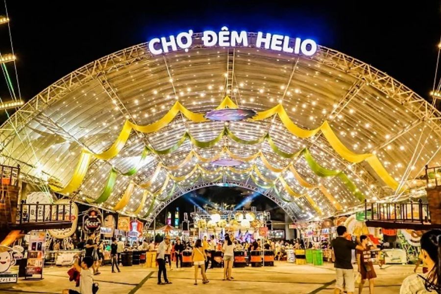 Helio Night Market entrance arch lit up at night in Da Nang